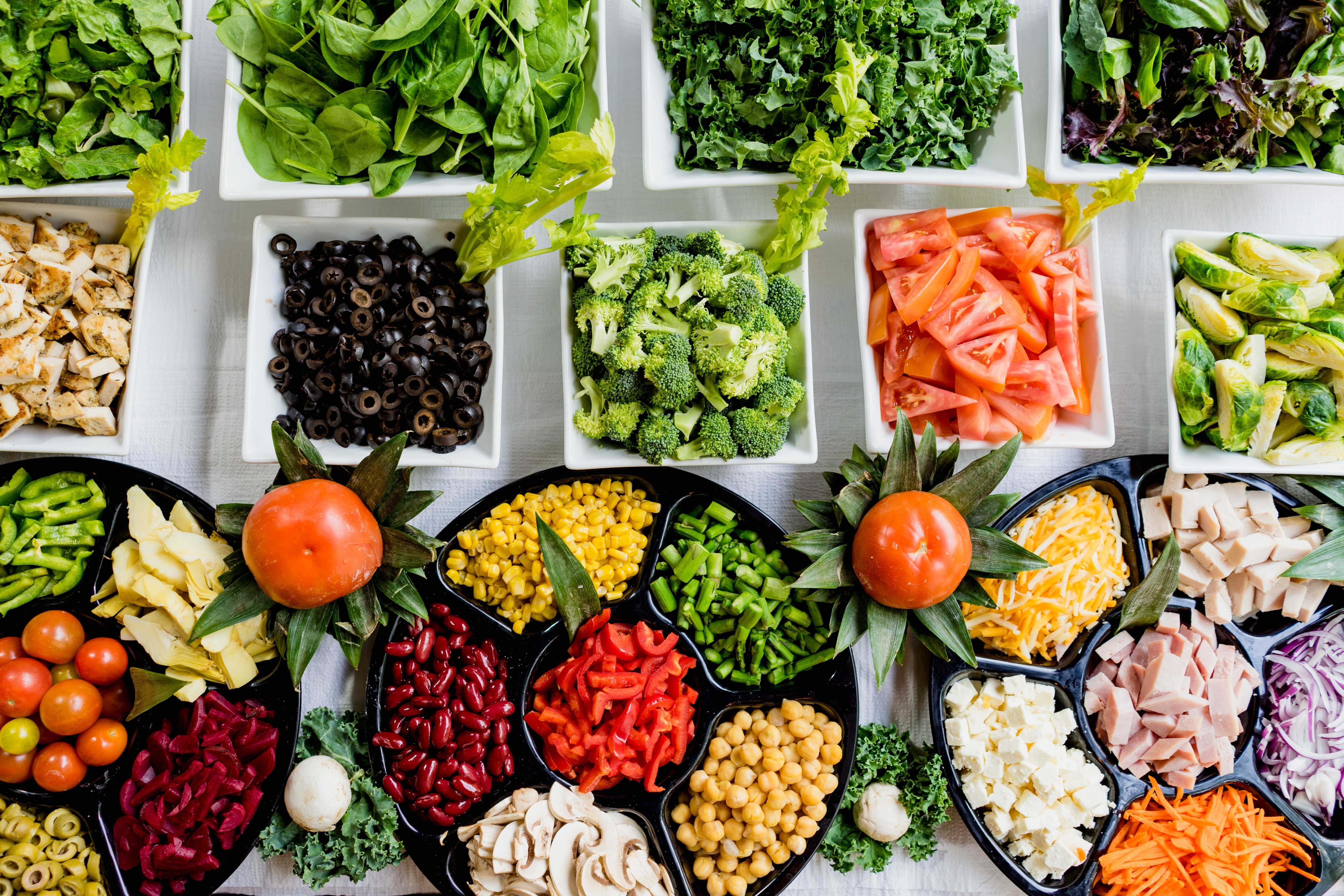 A photo showing a table of food for people to choose
