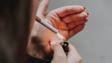 A woman smoking a cigarette 