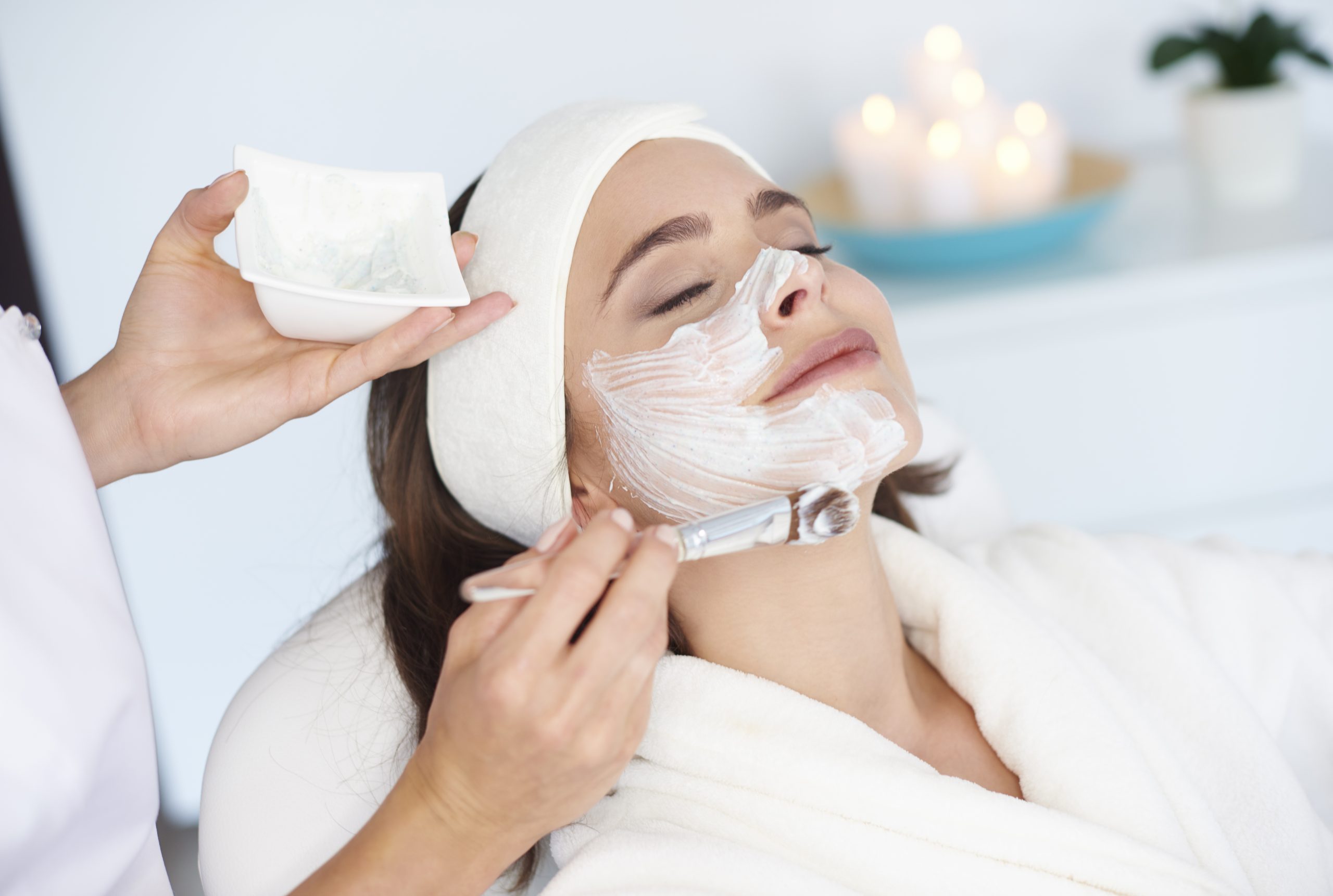 a woman having anti-aging treatments facial