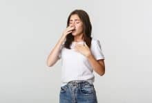 The Cold and Flu: Understanding the Basic Respiratory Conditions 3 young woman with allergy sneezing girl feeling sick having runny nose 1