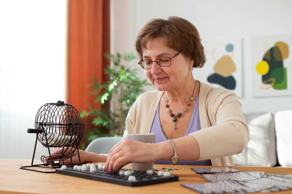 Revitalizing Your Golden Years- The Best Exercises for People Over 50 4 medium shot woman playing bingo